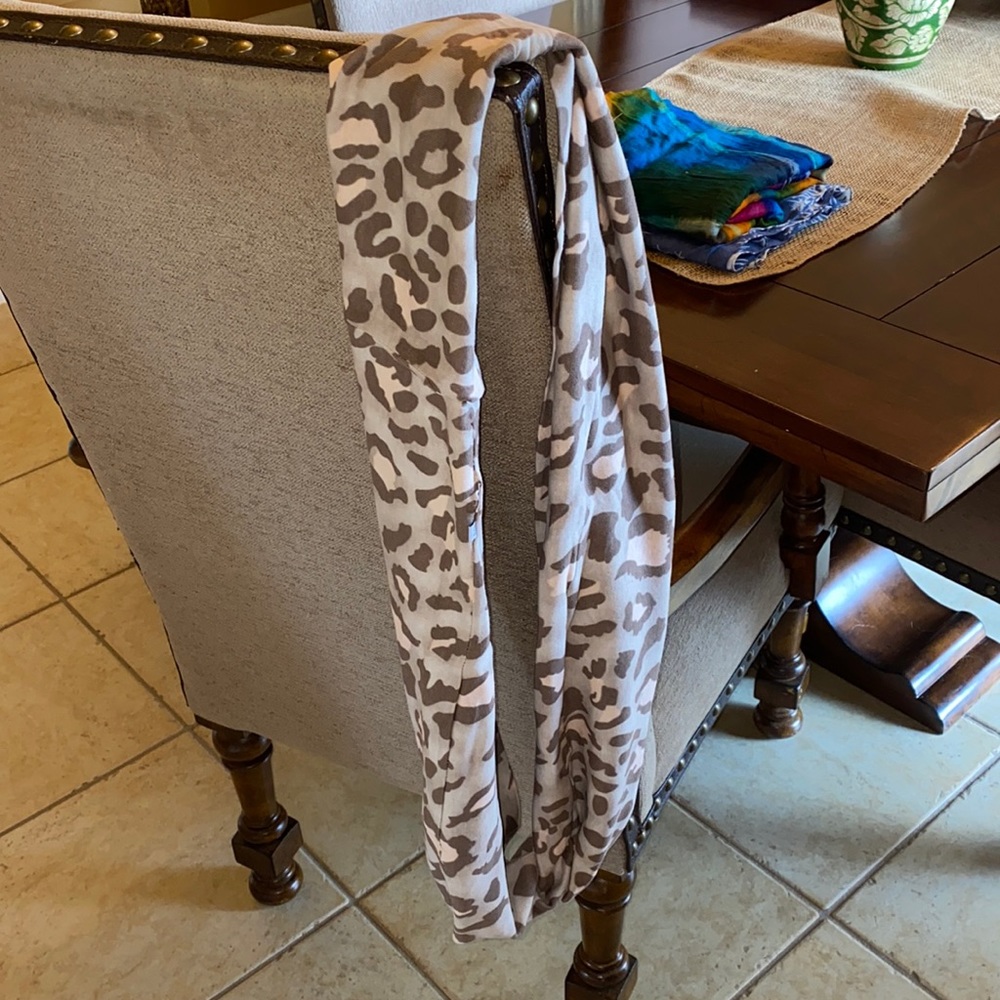 Long infinity scarf. EUC!! Colors are parchment with darker brown and pink.